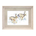 Hurtling Hares Framed Print
