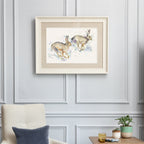 Hurtling Hares Framed Print